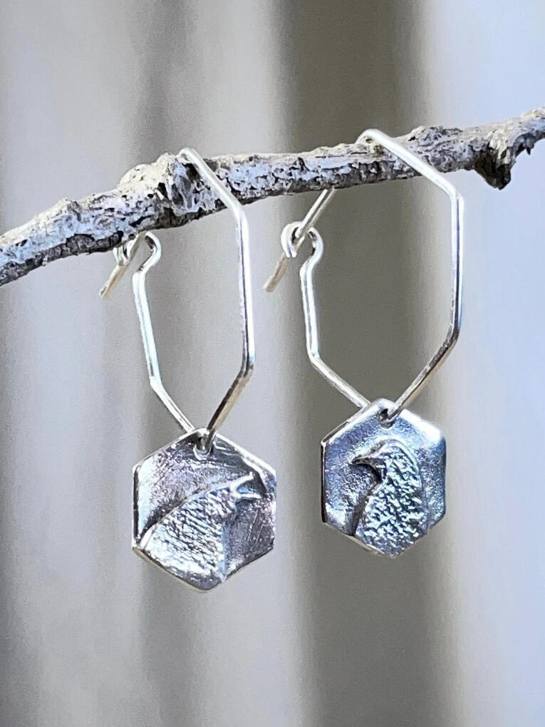 Crow friendship earrings. Crows move in the buddy system -- sometimes loud and sometimes silent, but always present. Also available as a friendship charm set.