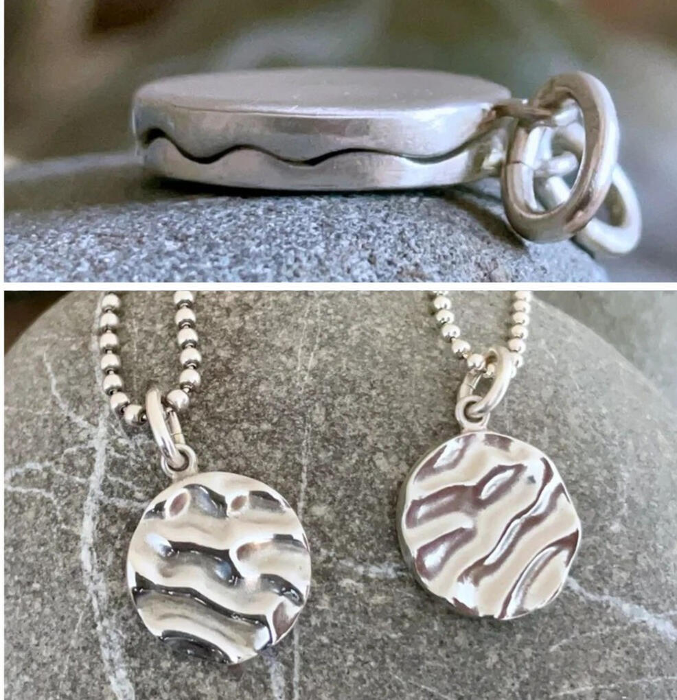 Kelp friendship pendant set. One pendant was molded from one side of a piece of kelp; the other pendant was molded from the flipside of the kelp. That's why they come back together so snugly!